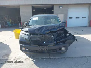 2020 Honda Ridgeline RTL with VIN 5FPYK3F59LB023212, listed as a IAAI auction lot 40704228 with 73,259 mi miles and . Bid and sale history available at DreamBid. Image 13.