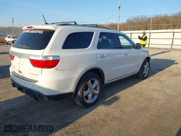 2012 Dodge Durango Citadel with VIN 1C4SDHET3CC121753, listed as a IAAI auction lot 41775187 with 198,041 mi miles and . Bid and sale history available at DreamBid. Image 4.