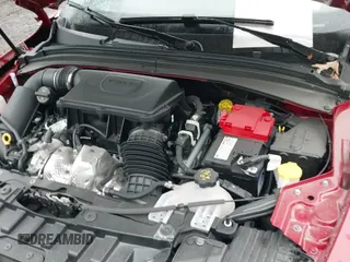 2024 Dodge Hornet GT Plus z VIN ZACNDFBNXR3A20373, wystawiony jako IAAI lot #41443542 z przebiegiem 1 388 mil mil oraz . Historia ofert i sprzedaży dostępna na DreamBid. Obrazek 19.