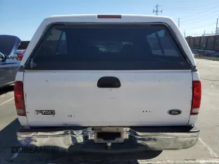 2000 Ford F-150 XL with VIN 1FTZX172XYNC01869, listed as a Copart auction lot 47414095 with 0 mi miles and Salvage Title. Bid and sale history available at carsss.com. Image 6.