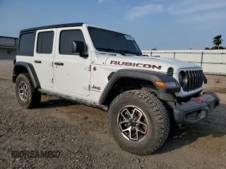 2024 Jeep Wrangler Rubicon with VIN 1C4PJXFG9RW280570, listed as a Copart auction lot 54519055 with 10,638 mi miles and Salvage title. Bid and sale history available at DreamBid. Image 4.
