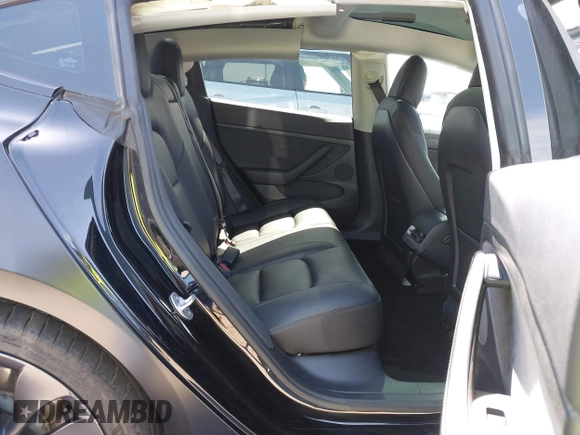 2022 Tesla Model 3 Performance with VIN 5YJ3E1EC6NF104475, listed as a IAAI auction lot 41734724 with 31,717 mi miles and . Bid and sale history available at carsss.com. Image 8.