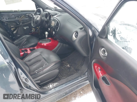 2014 Nissan Juke S with VIN JN8AF5MVXET358075, listed as a IAAI auction lot 41555484 with 122,862 mi miles. Bid and sale history available at carsss.com. Image 5.