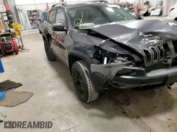 2018 Jeep Cherokee Trailhawk with VIN 1C4PJMBB8JD599791, listed as a Copart auction lot 86650054 with 66,360 mi miles and Non Repairable. Bid and sale history available at DreamBid. Image 12.