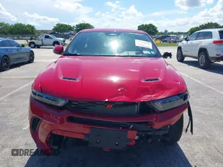 2024 Dodge Hornet R/T with VIN ZACPDFCW7R3A44078, listed as a IAAI auction lot 42603078 with 7,540 mi miles and . Bid and sale history available at DreamBid. Image 6.