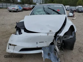 2021 Tesla Model Y Standard Range z VIN 5YJYGDED1MF109091, wystawiony jako Copart lot #50414004 z przebiegiem Nie podano mil oraz Szkody całkowita. Historia ofert i sprzedaży dostępna na DreamBid. Obrazek 5.