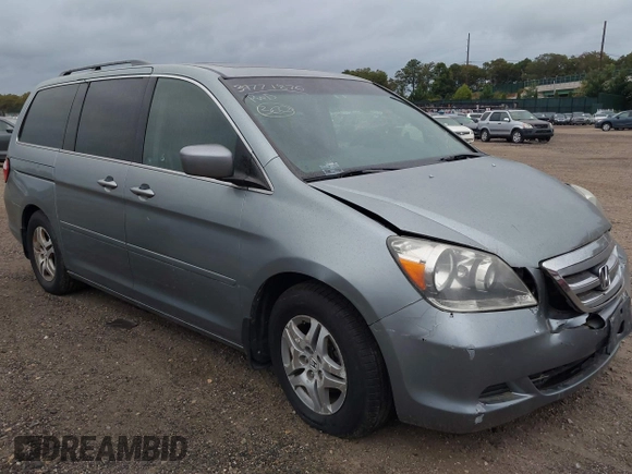 2005 Honda Odyssey EX-L with VIN 5FNRL38625B041067, listed as a IAAI auction lot 40519464 with 117,606 mi miles and . Bid and sale history available at carsss.com. Image 1.