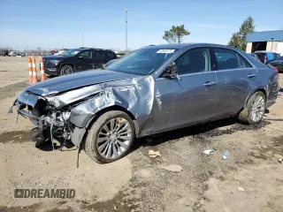 2019 Cadillac CTS Luxury AWD z VIN 1G6AX5SX6K0141958, wystawiony jako Copart lot #48564975 z przebiegiem 56 569 mil mil oraz Czysty tytuł • Clean title. Historia ofert i sprzedaży dostępna na DreamBid. Obrazek 1.