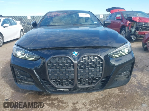 2022 BMW 4 Series 430i with VIN WBA53AP09NCJ24098, listed as a IAAI auction lot 41395007 with 34,062 mi miles and . Bid and sale history available at carsss.com. Image 13.
