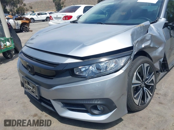 2018 Honda Civic EX-L z VIN JHMFC1F79JX037843, wystawiony jako IAAI lot #42121623 z przebiegiem 49 759 mil mil oraz . Historia ofert i sprzedaży dostępna na DreamBid. Obrazek 19.