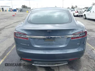 2013 Tesla Model S with VIN 5YJSA1CN8DFP21869, listed as a IAAI auction lot 41772603 with Not provided miles and . Bid and sale history available at DreamBid. Image 15.