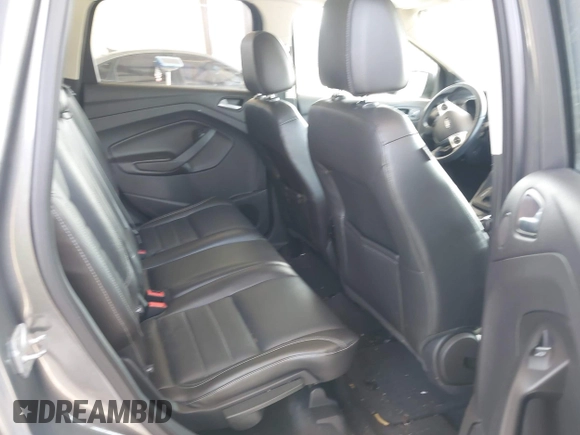 2014 Ford Escape Titanium with VIN 1FMCU9JX0EUC45801, listed as a IAAI auction lot 42121561 with 80,217 mi miles and . Bid and sale history available at DreamBid. Image 8.