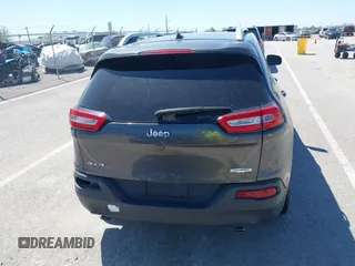 2014 Jeep Cherokee Latitude with VIN 1C4PJMCS2EW137767, listed as a IAAI auction lot 42052071 with 165,300 mi miles and . Bid and sale history available at DreamBid. Image 16.