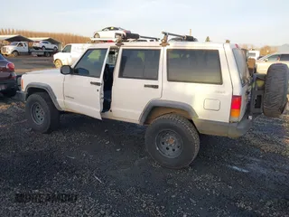 2000 Jeep Cherokee z VIN 1J4FF28P6YL132738, wystawiony jako IAAI lot #41382855 z przebiegiem 196 213 mil mil oraz . Historia ofert i sprzedaży dostępna na DreamBid. Obrazek 3.