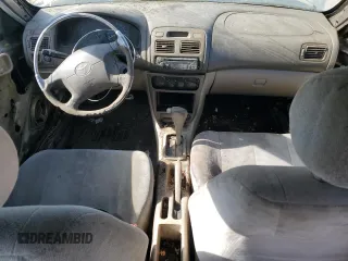 1998 Toyota Corolla VE with VIN 1NXBR12E3WZ093073, listed as a Copart auction lot 58270705 with 303,875 mi miles and Salvage title. Bid and sale history available at DreamBid. Image 8.