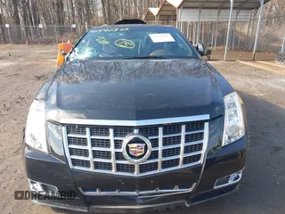 2014 Cadillac CTS Premium with VIN 1G6DH1E32E0177775, listed as a IAAI auction lot 41540366 with 106,398 mi miles and . Bid and sale history available at DreamBid. Image 12.