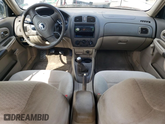 2003 Mazda Protege DX with VIN JM1BJ225X30107443, listed as a Copart auction lot 54777625 with 283,760 mi miles and Clean Title. Bid and sale history available at DreamBid. Image 8.