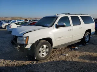 2014 Chevrolet Suburban LT with VIN 1GNSKJE74ER193634, listed as a Copart auction lot 88562635 with 163,436 mi miles and Salvage Title. Bid and sale history available at carsss.com. Image 1.
