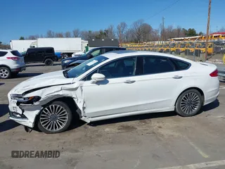 2018 Ford Fusion Titanium with VIN 3FA6P0D93JR162212, listed as a IAAI auction lot 41767723 with 134,010 mi miles and . Bid and sale history available at DreamBid. Image 14.