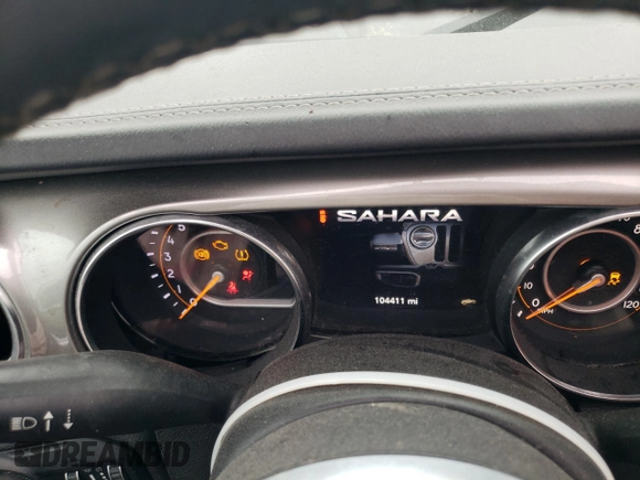 2020 Jeep Wrangler Unlimited Sahara with VIN 1C4HJXENXLW148140, listed as a Copart auction lot 43897435 with 104,411 mi miles and Salvage Title. Bid and sale history available at carsss.com. Image 9.