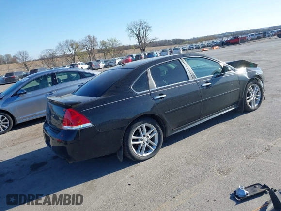 2013 Chevrolet Impala LTZ with VIN 2G1WC5E3XD1237776, listed as a IAAI auction lot 42023033 with 143,279 mi miles and . Bid and sale history available at DreamBid. Image 4.