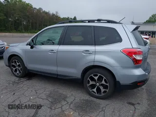 2014 Subaru Forester XT Touring with VIN JF2SJGMC1EH552474, listed as a IAAI auction lot 42461663 with 121,482 mi miles and . Bid and sale history available at DreamBid. Image 3.