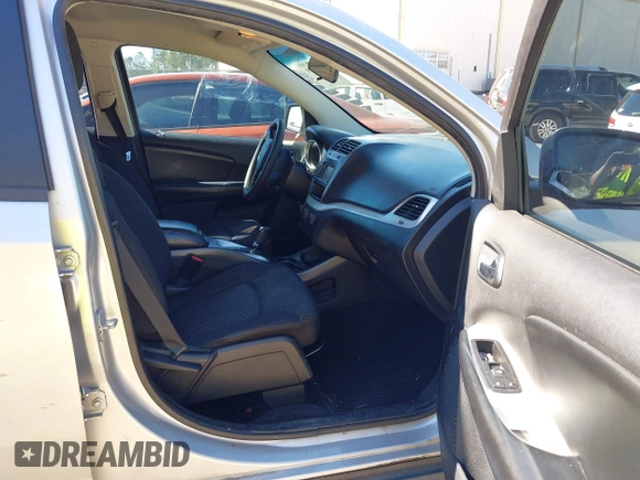 2014 Dodge Journey American Value Pkg with VIN 3C4PDCAB7ET259230, listed as a IAAI auction lot 41675179 with 151,386 mi miles. Bid and sale history available at carsss.com. Image 5.