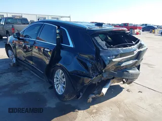 2019 Cadillac XT5 FWD with VIN 1GYKNARS7KZ117913, listed as a IAAI auction lot 41228767 with 105,335 mi miles and . Bid and sale history available at carsss.com. Image 3.
