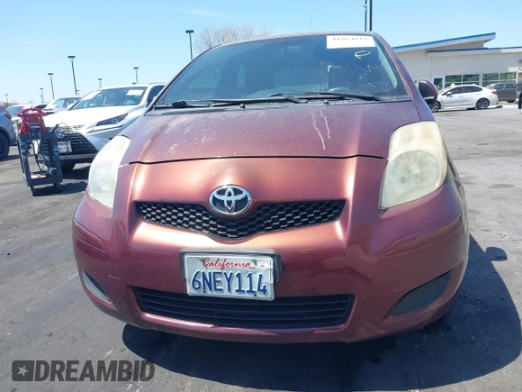 2010 Toyota Yaris with VIN JTDJT4K38A5324103, listed as a IAAI auction lot 41964619 with 149,874 mi miles. Bid and sale history available at carsss.com. Image 13.