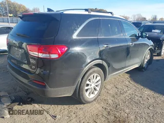 2017 Kia Sorento LX z VIN 5XYPG4A50HG287924, wystawiony jako IAAI lot #41078288 z przebiegiem Nie podano mil oraz . Historia ofert i sprzedaży dostępna na DreamBid. Obrazek 4.
