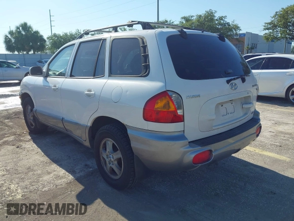 2004 Hyundai Santa Fe GLS with VIN KM8SC73D74U675555, listed as a IAAI auction lot 42021978 with 198,778 mi miles. Bid and sale history available at carsss.com. Image 3.