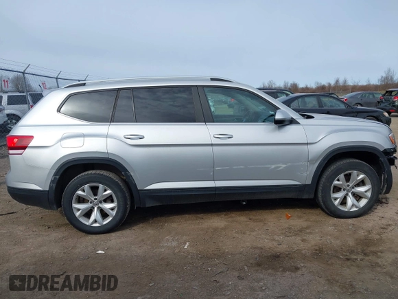 2018 Volkswagen Atlas SE with VIN 1V2KR2CA6JC560411, listed as a IAAI auction lot 41887472 with 168,155 mi miles and . Bid and sale history available at DreamBid. Image 14.