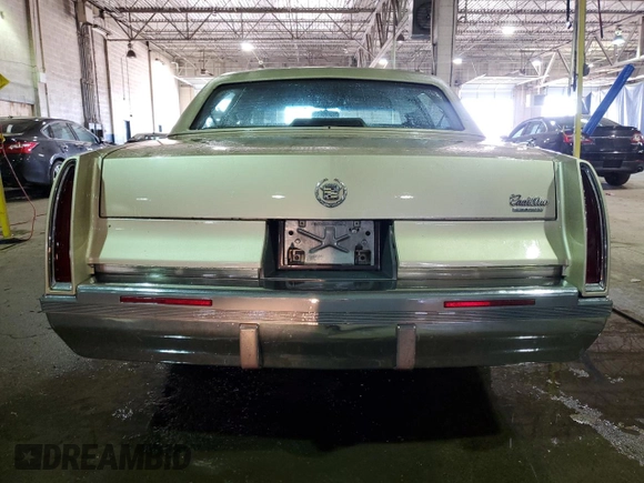 1995 Cadillac Fleetwood z VIN 1G6DW52P5SR715543, wystawiony jako Copart lot #51841755 z przebiegiem 92 222 mil mil oraz Czysty tytuł • Clean title. Historia ofert i sprzedaży dostępna na DreamBid. Obrazek 6.