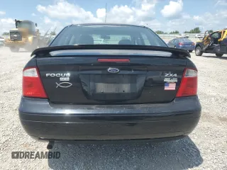 2006 Ford Focus S with VIN 1FAFP34N76W246035, listed as a Copart auction lot 61985015 with 196,498 mi miles and Salvage title. Bid and sale history available at DreamBid. Image 6.