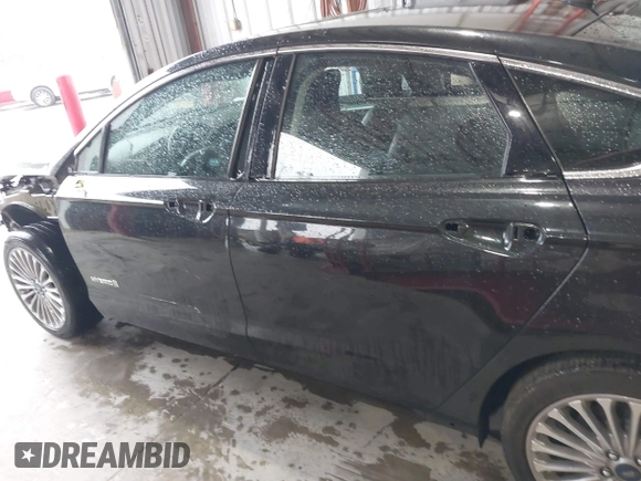 2013 Ford Fusion Titanium Hybrid with VIN 3FA6P0RU4DR281789, listed as a IAAI auction lot 41909115 with 161,008 mi miles and . Bid and sale history available at DreamBid. Image 15.