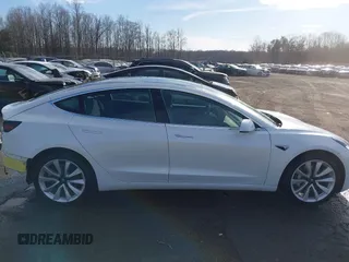 2019 Tesla Model 3 Long Range with VIN 5YJ3E1EB7KF442390, listed as a IAAI auction lot 41700122 with 65,539 mi miles. Bid and sale history available at carsss.com. Image 14.