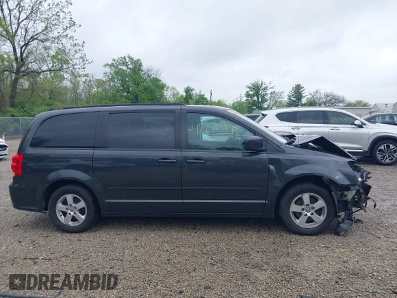 2012 Dodge Grand Caravan SXT with VIN 2C4RDGCG7CR236328, listed as a IAAI auction lot 42170991 with 72,831 mi miles and . Bid and sale history available at DreamBid. Image 14.