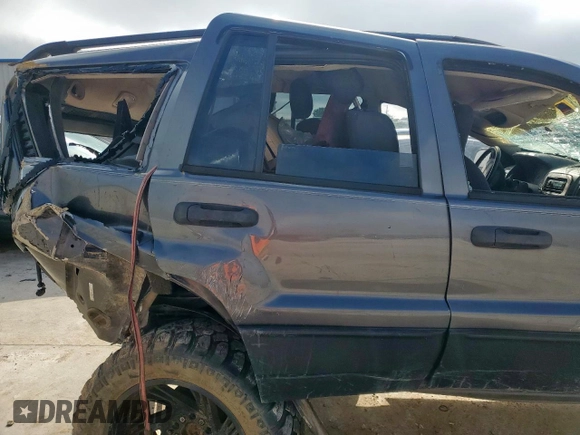 2003 Jeep Grand Cherokee Laredo with VIN 1J4GX48S63C604527, listed as a Copart auction lot 55996725 with Not provided miles and Non repairable. Bid and sale history available at DreamBid. Image 11.