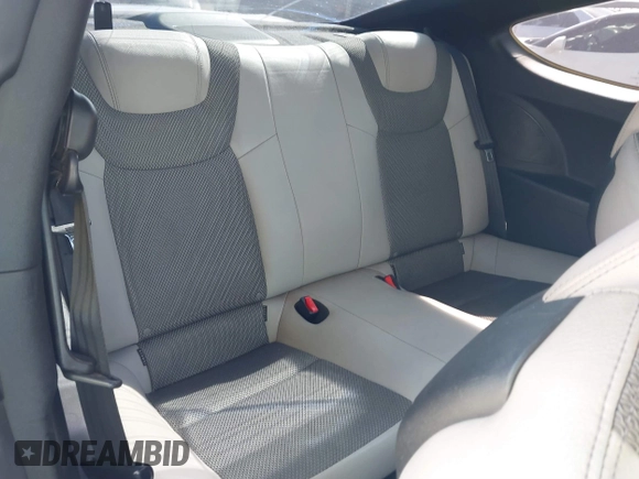 2013 Hyundai Genesis Coupe R-Spec with VIN KMHHT6KD2DU106506, listed as a IAAI auction lot 41611021 with 126,926 mi miles and . Bid and sale history available at DreamBid. Image 8.