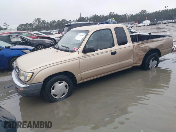 1999 Toyota Tacoma with VIN 4TAVL52N4XZ524059, listed as a IAAI auction lot 41761806 with 214,425 mi miles and . Bid and sale history available at DreamBid. Image 2.