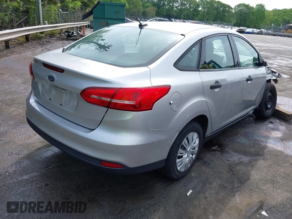 2017 Ford Focus S z VIN 1FADP3E21HL241557, wystawiony jako IAAI lot #42100036 z przebiegiem 106 764 mil mil oraz . Historia ofert i sprzedaży dostępna na DreamBid. Obrazek 4.