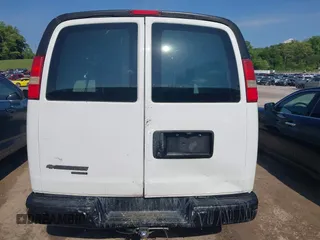 2014 Chevrolet Express Cargo Van with VIN 1GCWGFCG0E1100859, listed as a IAAI auction lot 42142748 with 182,900 mi miles. Bid and sale history available at carsss.com. Image 16.
