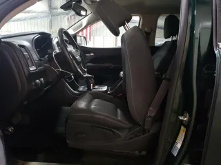 2015 GMC Canyon 4WD SLE with VIN 1GTG6BE38F1258880, listed as a Copart auction lot 57887664 with 142,346 mi miles and Salvage Title. Bid and sale history available at carsss.com. Image 7.