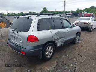 2006 Hyundai Santa Fe GLS z VIN KM8SC73D06U110499, wystawiony jako IAAI lot #42232639 z przebiegiem 136 491 mil mil oraz . Historia ofert i sprzedaży dostępna na DreamBid. Obrazek 4.