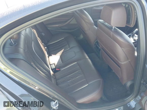 2018 BMW 5 Series M550i xDrive with VIN WBAJB9C51JB049513, listed as a IAAI auction lot 41146990 with 51,218 mi miles. Bid and sale history available at carsss.com. Image 8.