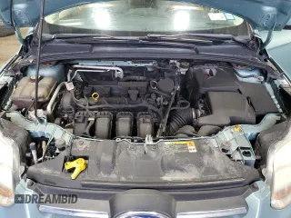 2012 Ford Focus SE with VIN 1FAHP3F27CL149328, listed as a Copart auction lot 56000325 with 147,097 mi miles and Salvage Title. Bid and sale history available at DreamBid. Image 11.