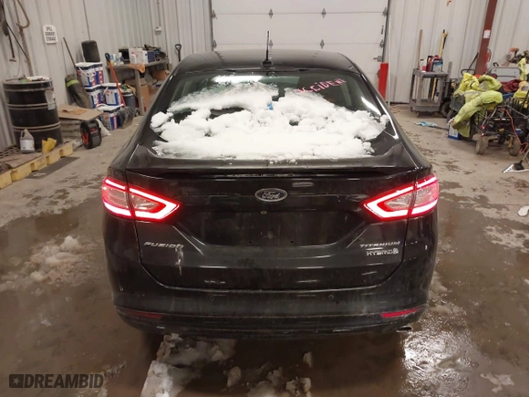 2014 Ford Fusion Titanium Hybrid with VIN 3FA6P0RUXER355654, listed as a IAAI auction lot 41611653 with 211,353 mi miles. Bid and sale history available at carsss.com. Image 16.