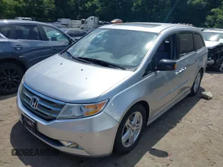 2012 Honda Odyssey Touring with VIN 5FNRL5H9XCB026741, listed as a IAAI auction lot 42808245 with 293,422 mi miles and . Bid and sale history available at DreamBid. Image 17.
