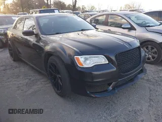 2013 Chrysler 300 with VIN 2C3CCAET6DH532484, listed as a IAAI auction lot 41744887 with 146,722 mi miles. Bid and sale history available at carsss.com. Image 1.