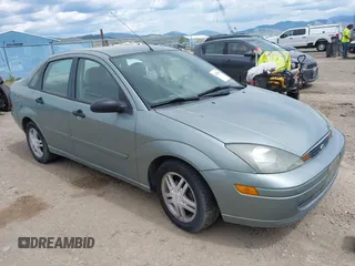 2003 Ford Focus SE z VIN 1FAFP34PX3W135265, wystawiony jako IAAI lot #42354012 z przebiegiem 79 617 mil mil oraz . Historia ofert i sprzedaży dostępna na DreamBid. Obrazek 1.